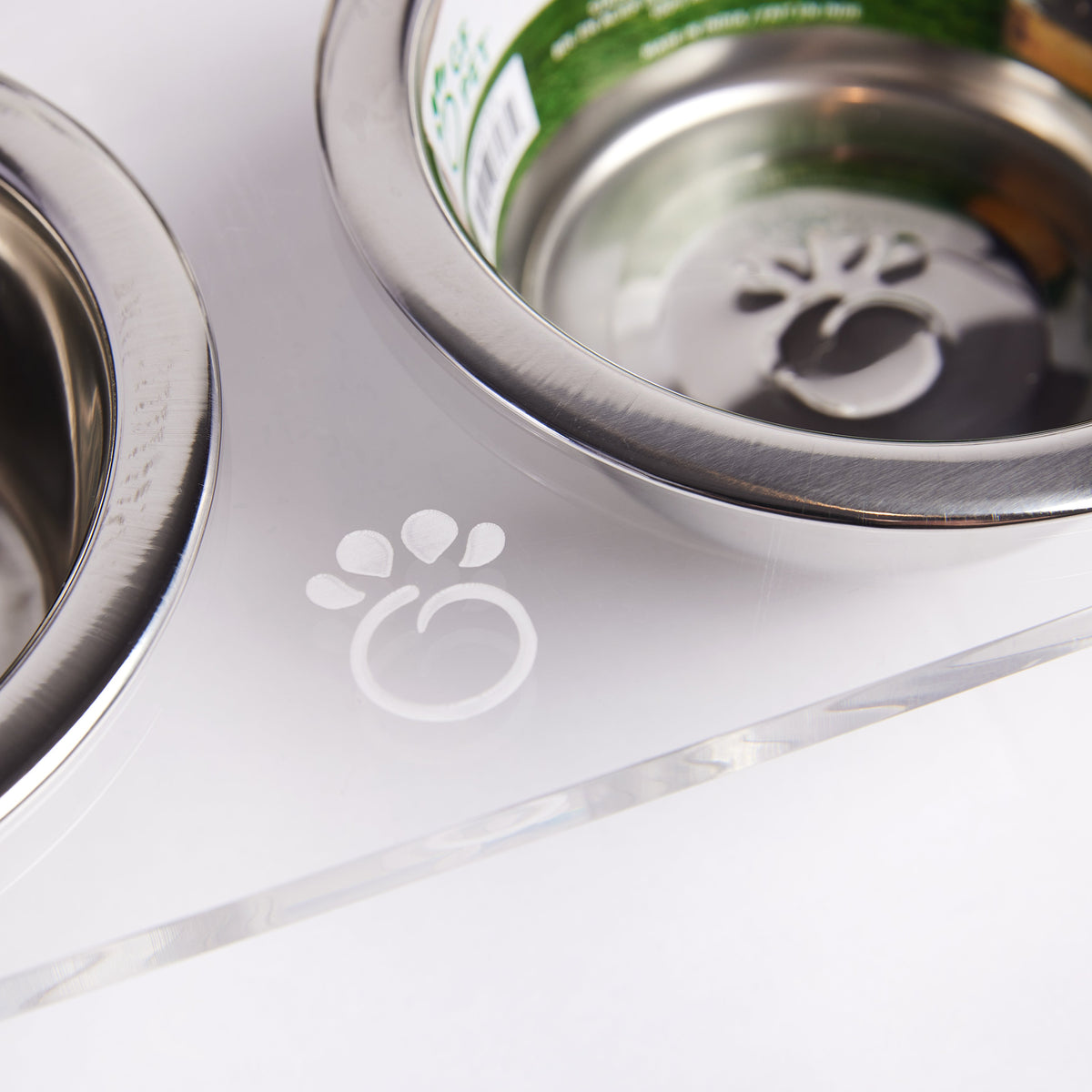 The GF PET® Acrylic Feeder is elevated and the pinnacle of simple elegance. Clear, clean, modern, and sturdy, the elevated base provides a comfortable and ergonomic feeding experience for your pet that favors good digestion. Includes 2 removable, dishwasher-safe stainless steel bowl inserts with authentic GF PET® logo paw. Gorgeous GF PET® etched logo paw. For dogs or cats. Match any décor!