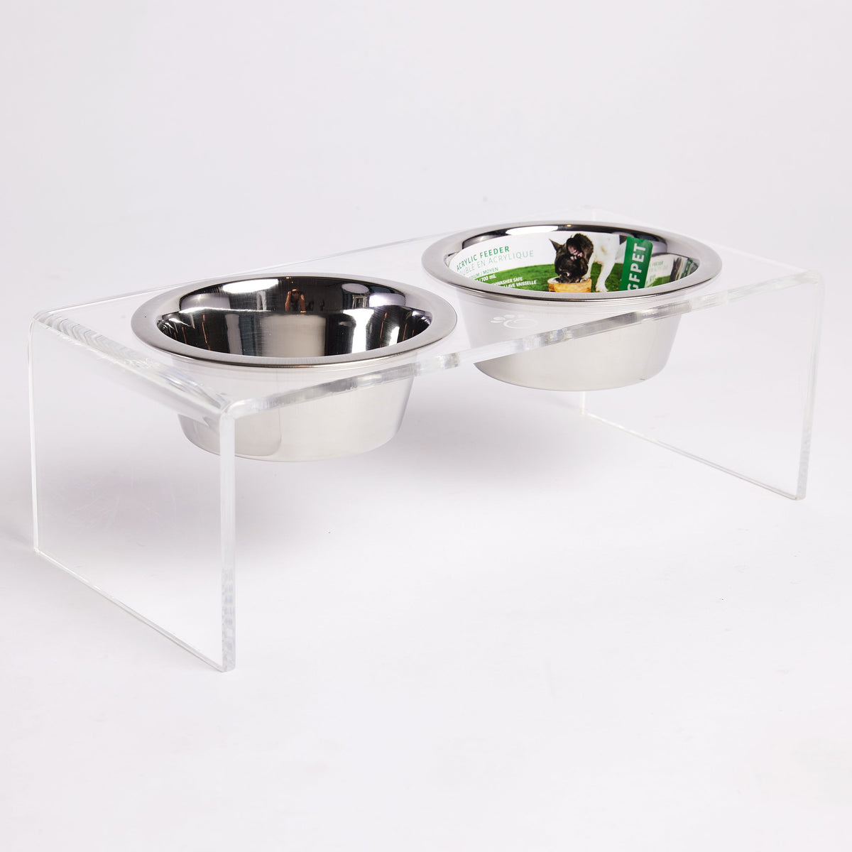 The GF PET® Acrylic Feeder is elevated and the pinnacle of simple elegance. Clear, clean, modern, and sturdy, the elevated base provides a comfortable and ergonomic feeding experience for your pet that favors good digestion. Includes 2 removable, dishwasher-safe stainless steel bowl inserts with authentic GF PET® logo paw. Gorgeous GF PET® etched logo paw. For dogs or cats. Match any décor!