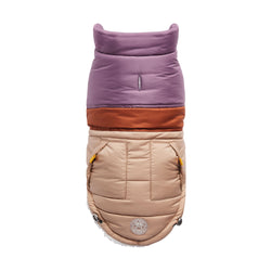 fashion and warmth. Its' ultra puff look and trendy color blocks are a stunning statement of canine vogue! Both retro and modern at the same time, this gorgeous puffer sports oversized faux pockets, accent stitching and next generation styling.  With GF PET signature pocket tabs & contrast binding, this retro puffer keeps it real with snuggly warm popcorn sherpa lining.  Water repellent and super adjustable,