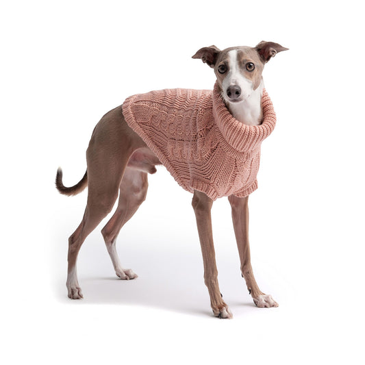 The GF PET Chalet Sweater is chunky and snuggly soft. The high turtleneck, ribbed arm holes and sculpted body shape make for a super comfy fit for both boy and girl doggies. A timeless and luxurious cable knit classic!  Product details:  Quality oversize knit Secure ribbed arm holes Turtleneck Superior fit